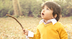 boy playing with stick