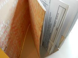 recycled paper notebook facing pages