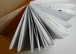 recycled paper notebook signatures glued